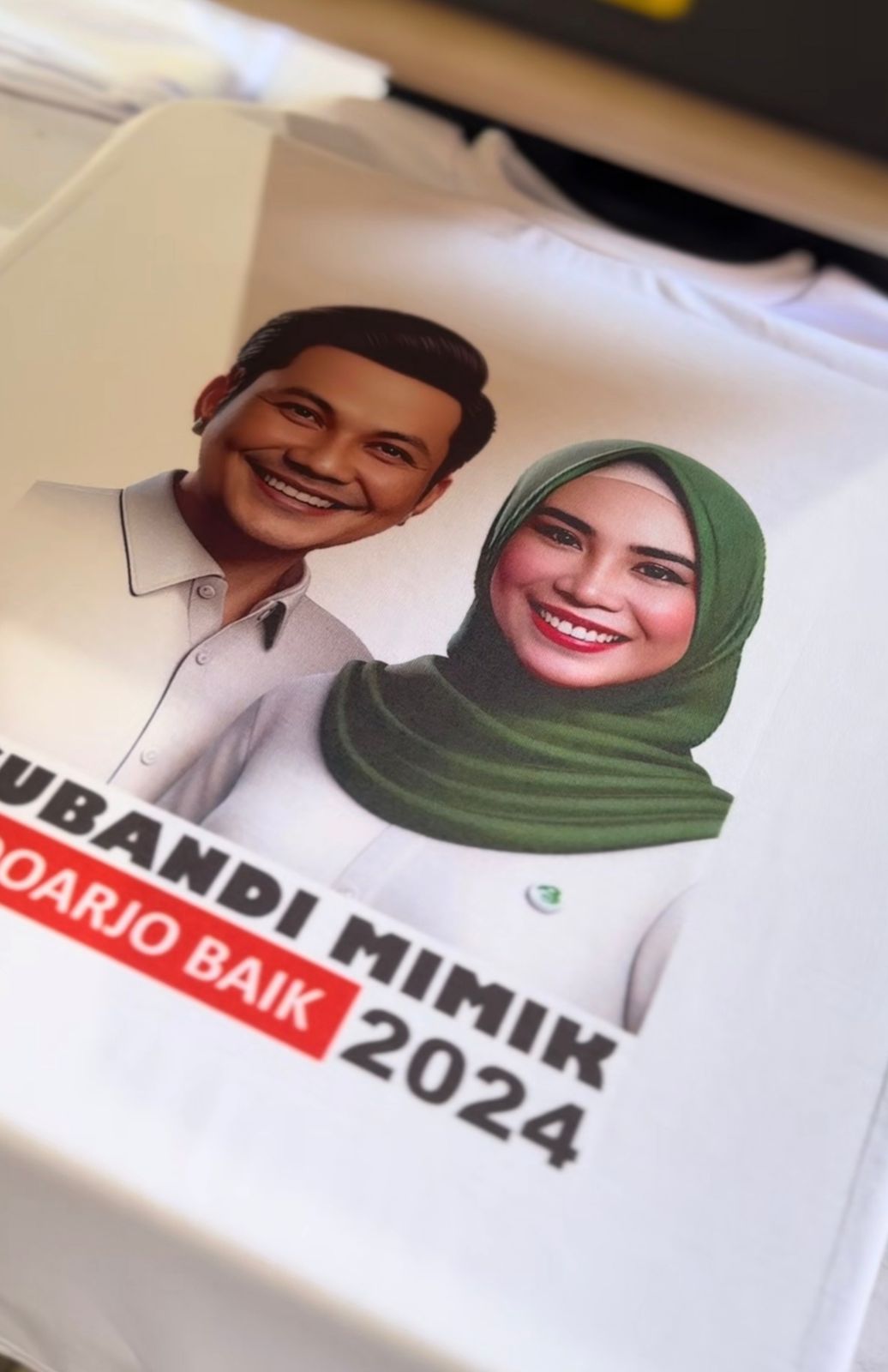 Kaos, Bendera & Spanduk Kain – Syailendra Konveksi